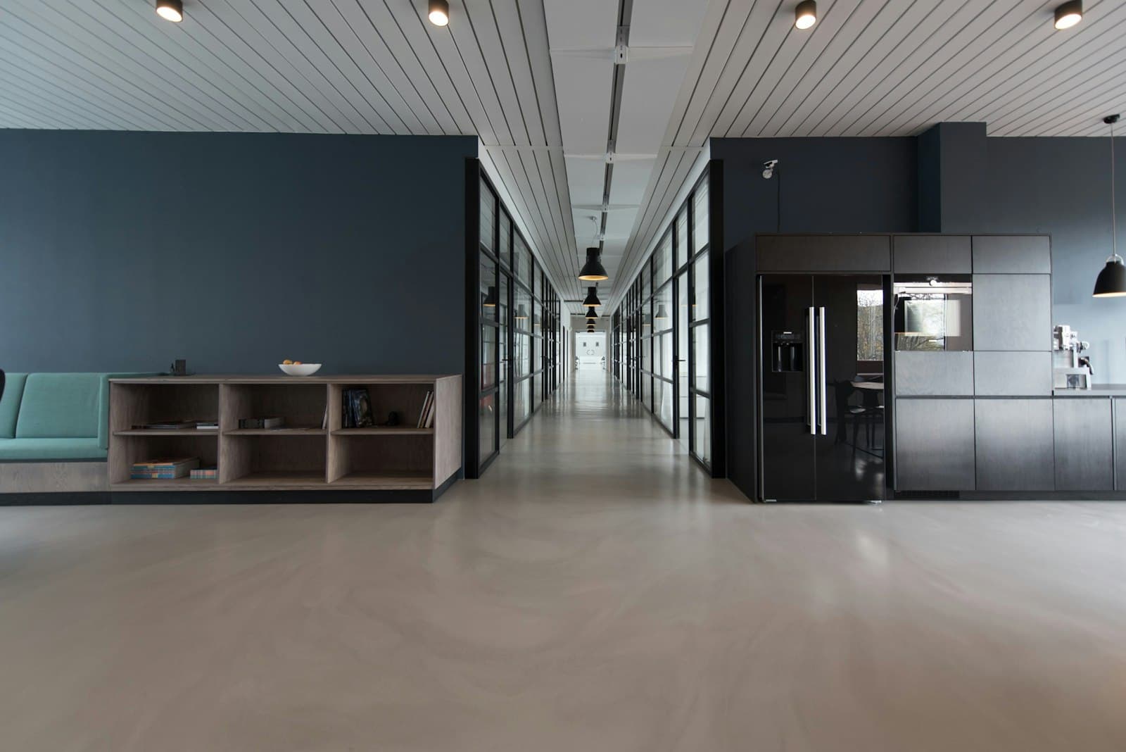 Contemporary home office with built-in shelving and desk